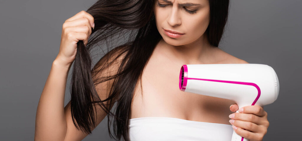 stylizacja włosów za pomocą urządzeń termicznych i jej wpływ na kondycję włosów